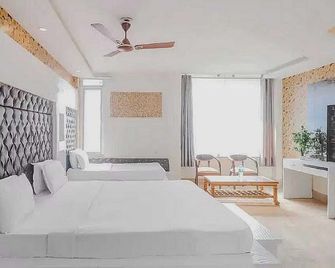 Super Hotel O Vivaan Residency - Rohtak - Bedroom