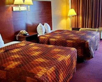 Conway Express Inn - Conway - Schlafzimmer