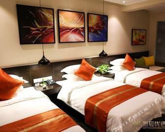 Maijian Hotel (Shenyang Convention and Exhibition Center Sports College South Station Branch) - Shenyang - Bedroom