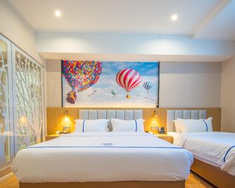 Aegean Art Hotel (Chaozhou People's Square Fortune Center) - Chaozhou - Bedroom