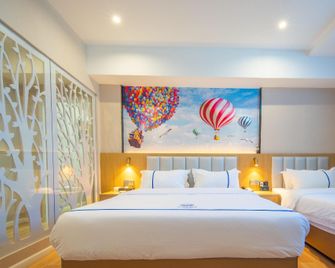 Aegean Art Hotel (Chaozhou People's Square Fortune Center) - Chaozhou - Camera da letto