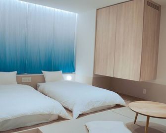 Sekai Hotel Takaoka - Takaoka - Schlafzimmer