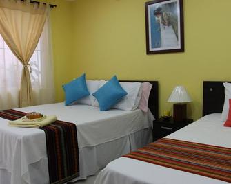 Double Room With Extra Bed - Cali - Kamar Tidur