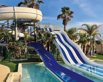 Maison avec piscine chauffée de Pâques à la toussaint TAMARIS accès animation & parc aquatique DE juin à fin septembre - Portiragnes - Piscine