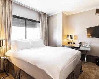 מלון ברדיצ'בסקי - תל אביב - חדר שינה