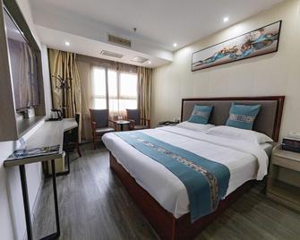 Greentree Inn Anhui Anqing Taihu East Renmin Road Cultural Expo Park Express Hotel - Anqing - Bedroom