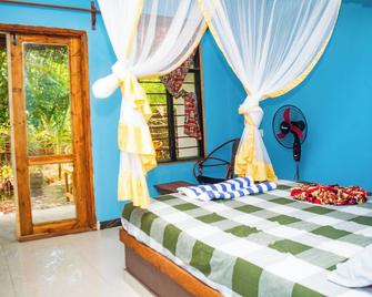 Z-Village Lodge - Jambiani - Schlafzimmer