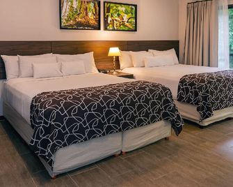 إيف أوتل دي سيلفا - بويرتو اجوازو - غرفة نوم