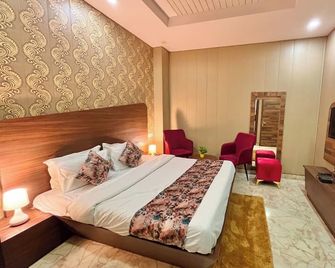 Hotel Pearl Grand - Zerakpur - Slaapkamer