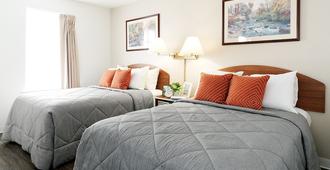 Intown Suites Extended Stay Raleigh Nc - Raleigh - Bedroom