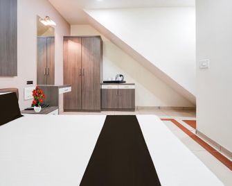 Collection O Sachivalay Gandhinagar Hotel Ghunghat - Gandhinagar - Schlafzimmer