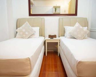 Makati Riverside Inn - מאקאטי סיטי - חדר שינה