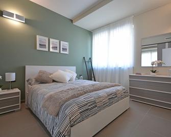 Atmosfera Apartments & Suites - Borgaro Torinese - Sypialnia
