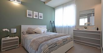 Atmosfera Apartments & Suites - Borgaro Torinese - Bedroom