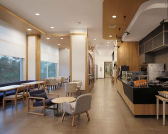 Holiday Inn Express Pune Hinjewadi by IHG - Pune - Restaurace