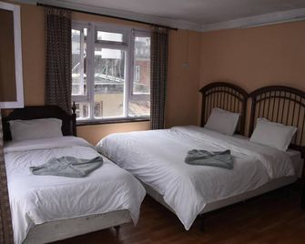 Family Peace House - Kathmandu - Slaapkamer