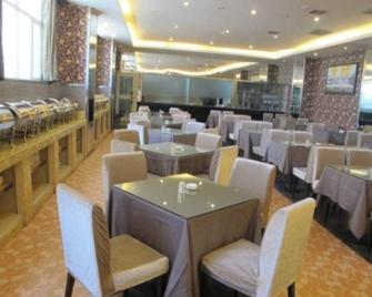Aksu Pudong Holiday Hotel - Aksu - Restaurante