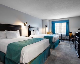 رمادا باي ويندام سوري/لانغلي - سورراي - غرفة نوم