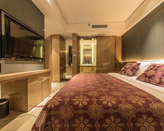 Chongqing Excel Grand Hotel - Chongqing - Habitación