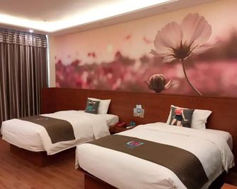 Pai Hotel Jinan Railway Staion North Plaza Dikou Road - Jinan - Schlafzimmer