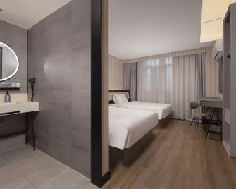Hanting Hotel Nanjing Hanzhongmen Metro Station - Nanjing - Bedroom