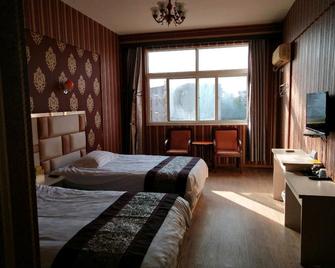Baiyun Hotel - Lishui - Slaapkamer