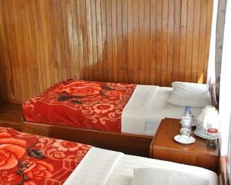 Nanda Wunn Hotel - Nyaungshwe - Habitación