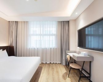 Hanting Hotel (Ningde Wanda) - Ningde - Bedroom