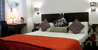 Sarin Inn Boutique Hotel - Varanasi - Schlafzimmer