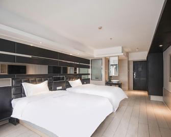 Qingmu Hotel (Nanjing Danfeng Street Zhujiang Road Metro Station) - Nankín - Habitación