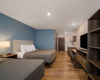 Woodspring Suites Wesley Chapel-Tampa - Wesley Chapel - Schlafzimmer