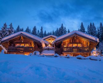 Enchanting hut in Almdorf Flachau with fireplace, private sauna and alpine charm - Flachau - Bâtiment