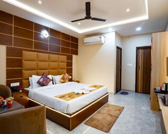 V S Residency Hotel - Benares - Slaapkamer