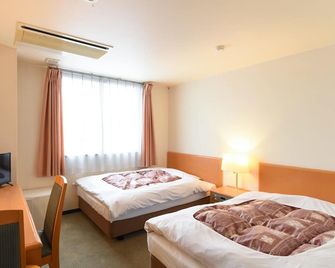 Hotel Kaito - Takashima - Slaapkamer