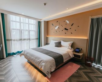 Coin Camp Inn - Nanjing - Schlafzimmer