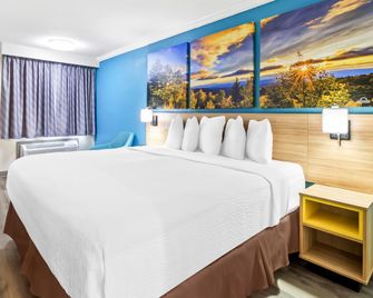 Days Inn by Wyndham Houston East - Houston - Bedroom