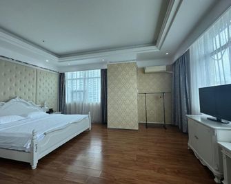 Wangchao Business Hotel - Pej-chaj - Ložnice