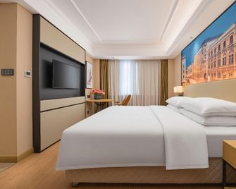 Vienna Hotel Tianjin Guizhou Road Branch - Tianjín - Habitación
