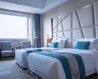 Huidong Hotel - Zigong - Bedroom