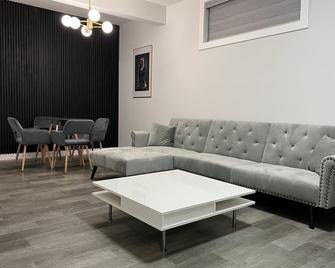 Modern Luxury Private Suite - Airdrie - Living room