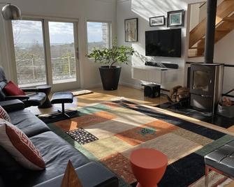 Spacious home with 3 decks of spectacular views overlooking Provincetown Harbor - Provincetown - Living room
