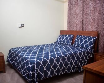 Kadoued Furnished Apartment 2 Bedroom - Ouagadougou - Bedroom