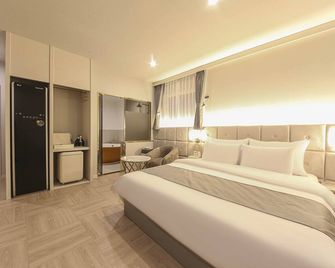 Busan Premium Denvasta Beomil Branch - Busan - Bedroom