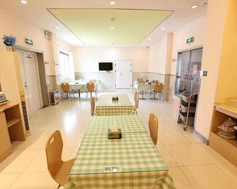 Grace Inn Qingdao Middle Chongqing Road Airport Branch - Qingdao - Comedor