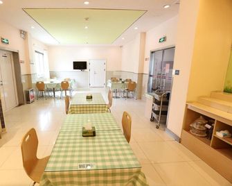 Grace Inn Qingdao Middle Chongqing Road Airport Branch - Qingdao - Comedor