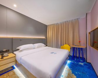 Lifu Hotel Tianhe Gangding Metro Station Guangzhou - غوانغزهو - غرفة نوم