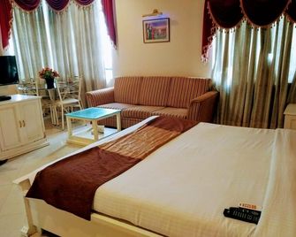 فاب هوتل راج إنترناشونال - حيدر أباد - غرفة نوم