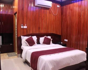 Tango Beach Resort - Lakshmanpur - Bedroom