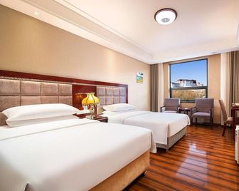 Verona International Hotel - Lhasa - Bedroom