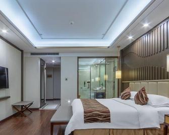 Jinding Hotel - Tangshan - Спальня